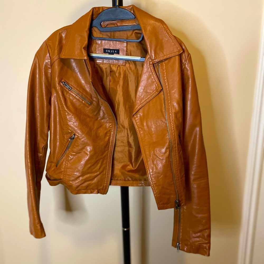 Women’s small/medium brown cropped leather jacket.